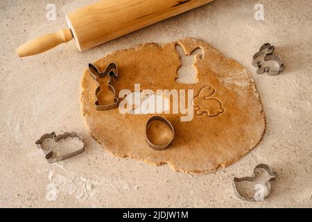 Easter baking flat lay.Spring symbols made from gingerbread.Homemade cookies.Easter bunny,rabbit,eggs and ducks from delicious honey dough.Happy Easte Stock Photo