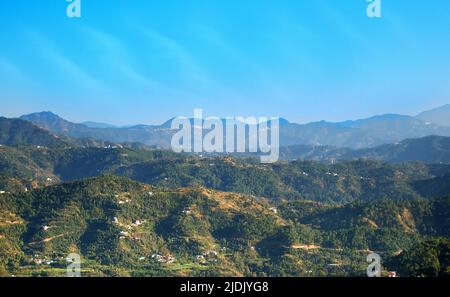 Spring mountain landscape of Outer Himalayas, upland villages. Himachal Pradesh, India Stock Photo