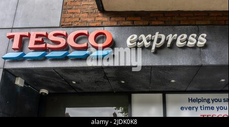 Tesco express sign over their store in Inchicore, Dublin, Ireland. Stock Photo