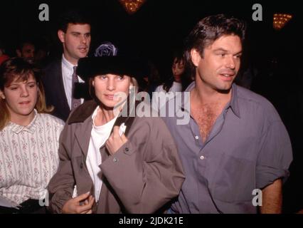 Nicollette Sheridan  and Harry Hamlin January 1991 Credit: Ralph Dominguez/MediaPunch Stock Photo