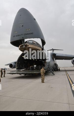 The 1st Attack Reconnaissance Battalion, 211th Aviation Regiment, Utah National Guard, load four AH-64D Apache helicopters onboard a C-5 Galaxy, to be transported to Morocco in support of African Lion 22, a U.S. Africa Command annual exercise on Saturday, June 18, 2022.     The 1-211th ARB aircraft maintaniners prepped the aircraft for loading onto the C-5 by folding the blades and then members of the 151st Air Refueling Wing, Utah Air National Guard, assisted in loading and securing the helicopters on the C-5 from Travis Air Force Base, California, for transportation to Morocco. Stock Photo