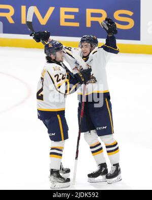 June 21, 2022, Saint John, NB, Canada: Edmonton Oil Kings' Carter Souch,  right, reacts after deflecting a shot by Shawinigan Cataractes' Jordan  Tourigny during the second period of Memorial Cup hockey action