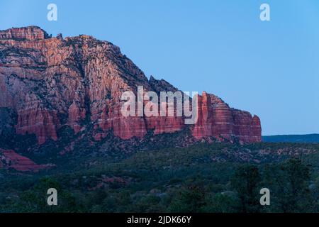 Beautiful red rocks in Sedona, Arizona illuminated at sunset Stock Photo