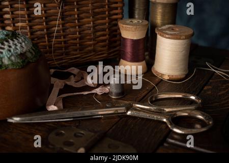 A selection of vintage sewing tools and equipment Stock Photo