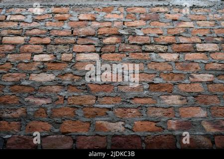 Wall was built by using bricks Stock Photo
