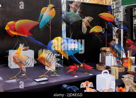 Multi-colored birds made of metal mesh on Nahalat Binyamin Street in Tel Aviv Stock Photo