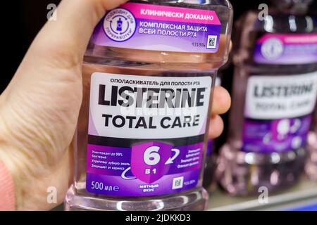 Tyumen, Russia-April 14, 2022: Listerine logo total care is an American brand of antiseptic mouthwash. Stock Photo