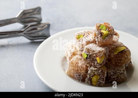 Traditional pistachio Turkish delight in a plate Stock Photo