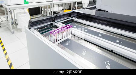 Saint-Petersburg, Russia - April 6, 2018: Blood samples are on the haematology automation line. Clinical laboratory and blood bank fully automated equ Stock Photo