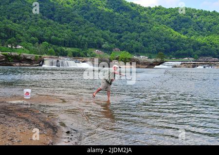 West Virginia's beautiful Kanawha Falls (New River) offer great fishing for a variety of species. Throw a castnet to collect baitfish! Stock Photo