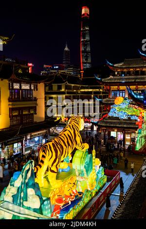 Tourists enjoy the lanterns display inside of Yu Yuan, Yu Garden, during the Lantern Festival in the Year of the Tiger. Stock Photo