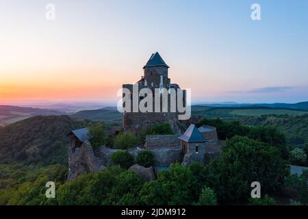Aerial view about castle of Hollókő. Located in the mountains of Cserhát near Hollokő village, which declared a Unesco world heritage site. Stock Photo