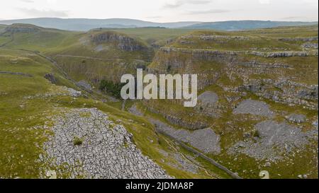 A drone shot of the limestone outcrop Comb Hill and surrounding area around of Malham and Malham Tarn Stock Photo