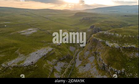 A drone shot of the limestone outcrop Comb Hill and surrounding area around of Malham and Malham Tarn Stock Photo