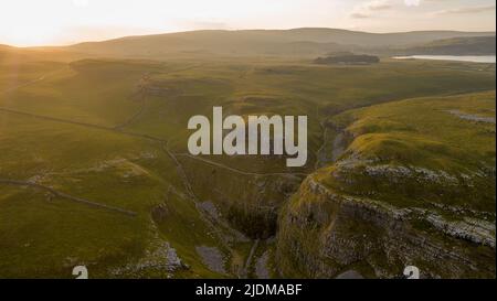 A drone shot of the limestone outcrop Comb Hill and surrounding area around of Malham and Malham Tarn Stock Photo