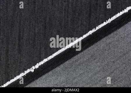 Black and grey jeans cloth textured background Stock Photo