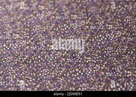 Dark fabric with colourful spots texture background Stock Photo