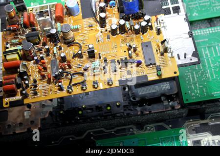 Repair Of Circuit Board With Microchips And Radio Components Stock Photo