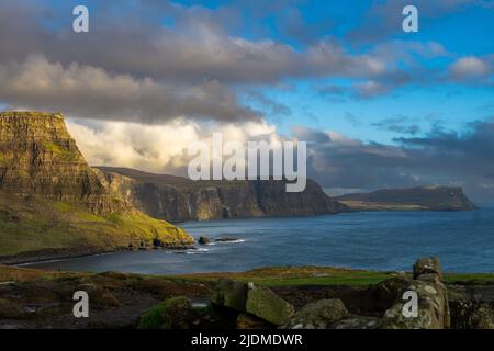 Clouds race above the Waterstein  Head Cliff on the Isle of Skye,Scotland Stock Photo