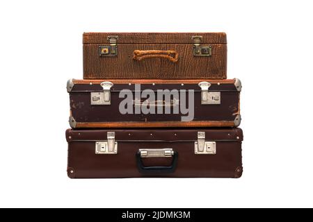 Stack of old leather vintage suitcases isolated on white Stock Photo