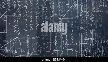Image of mathematical equations over cityscape Stock Photo