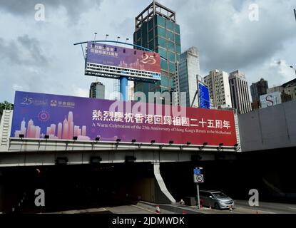 Hong Kong, China. 22nd June, 2022. Celebratory billboards are seen in Hong Kong, south China, June 22, 2022. This year marks the 25th anniversary of Hong Kong's return to the motherland. Credit: Lo Ping Fai/Xinhua/Alamy Live News Stock Photo