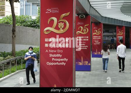 Hong Kong, China. 22nd June, 2022. Celebratory posters are seen in a street in Hong Kong, south China, June 22, 2022. This year marks the 25th anniversary of Hong Kong's return to the motherland. Credit: Wang Shen/Xinhua/Alamy Live News Stock Photo
