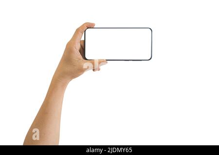 Male hand holding smart phone with white blank empty screen isolated on white background include clipping path. Using for mockup, browsing or social m Stock Photo