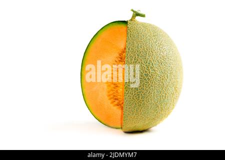 Half of japanese melons, orange melon or cantaloupe melon with seeds isolated on white background, summer fruits Stock Photo