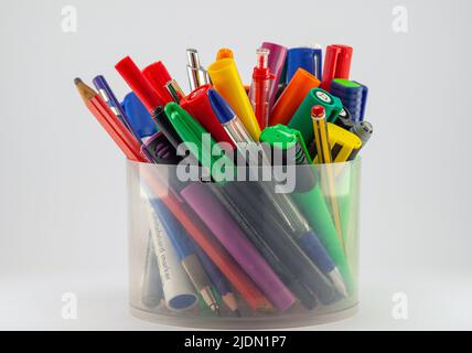 Colourd pencils in a cup on white background Stock Photo
