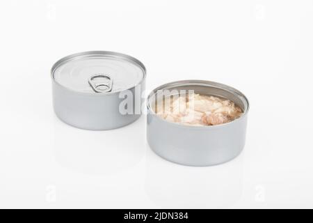 two cans of tuna on white background Stock Photo