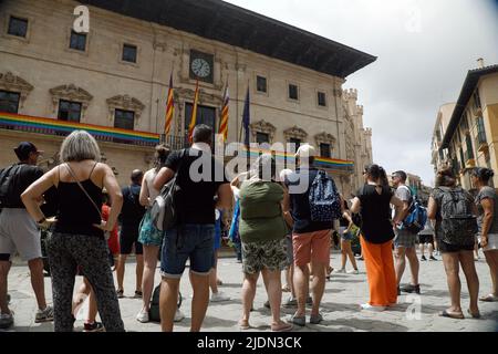 22 June 2022, Spain, Palma: Tourists walk through downtown Palma. Mallorca's global prices have been raised to compensate for the effects of the pandemic and inflation, and the foreign customer pays up to 200 euros more per day than in 2019. Photo: Clara Margais/dpa Stock Photo