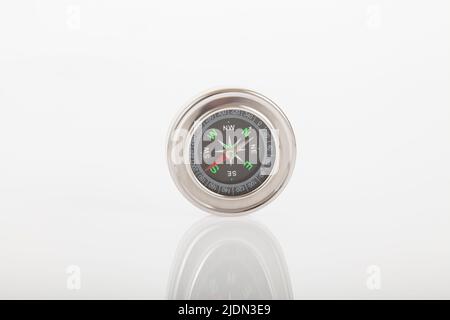Compass on neutral background Stock Photo - Alamy