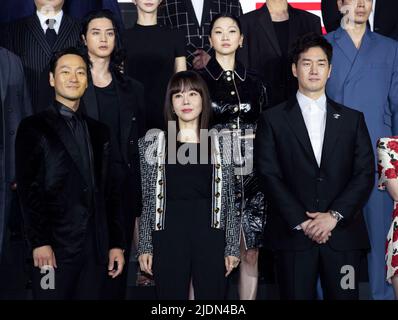 22 June 2022 - Seoul, South Korea : (L to R) Actors Yoo Ji-tae, Yunjin Kim, Park Hae-soo, Jeon Jong-seo, Kim Ji-hoon, Lee Hyun-woo, Jang Yoon-ju, Lee Joo-bin, Kim Sung-oh, Lee Won-jong, pose for photos during a press conference to promote the Netflix Film Money Heist: Korea – Joint Economic Area production report in Seoul, South Korea on June 22, 2022. The movie is to be released in South Korea on June 24. (Photo by Lee Young-ho/Sipa USA) Stock Photo