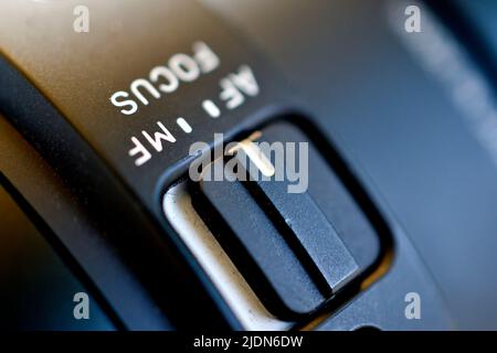 Closeup of the focus window on the camera lens. Close-up of the AF switch on the camera lens Stock Photo
