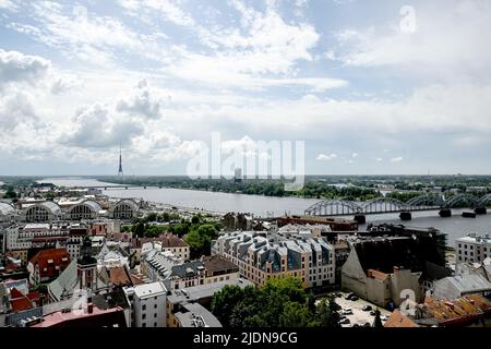 Riga, Latvia. 21st June, 2022. View over the old town of Riga and the river Düna. The Düna river flows into the Baltic Sea. Credit: Britta Pedersen/dpa/Alamy Live News Stock Photo