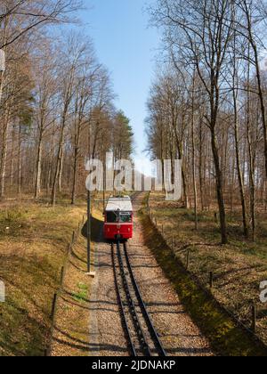 Zurich, Switzerland - March 26th 2022 - Red waggon of the Dolder cog railway  Stock Photo