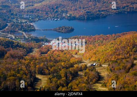 High-angle view of Mont-Tremblant lake and resort in autumn taken from the summit of Mont-Tremblant, Laurentians, Quebec, Canada. Stock Photo