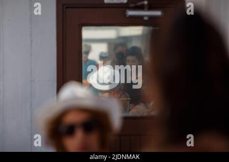 Tourists are seen on a ferry from Split to Supetar on the island of Brac, on June 22, 2022, in Split, Croatia. Photo: Zvonimir Barisin/PIXSELL Stock Photo