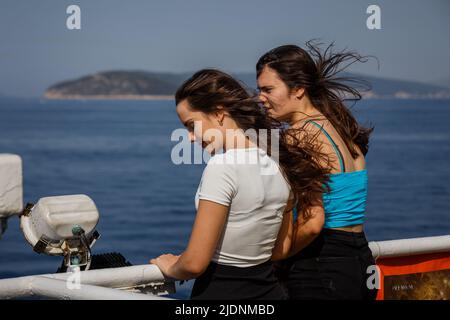 Tourists are seen on a ferry from Split to Supetar on the island of Brac, on June 22, 2022, in Split, Croatia. Photo: Zvonimir Barisin/PIXSELL Stock Photo