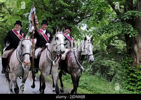 Peebles, UK. , . Beltane Wednesday - Cornets Installation, Rideout & Reel Cornet Iain Mitchell flanked by his Left & Right Hand men, arrive at Neidpath Tower, as part of the ceremonial riding of the marches. ( Credit: Rob Gray/Alamy Live News Stock Photo