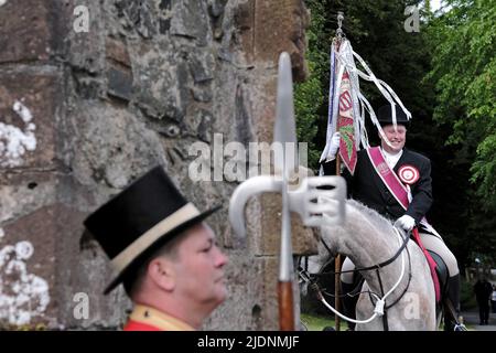 Peebles, UK. , . Beltane Wednesday - Cornets Installation, Rideout & Reel Cornet Iain Mitchell arrives at Neidpath Tower, as part of the ceremonial riding of the marches. ( Credit: Rob Gray/Alamy Live News Stock Photo