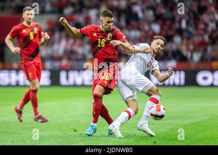 Thorgan Hazard of Belgium and Matty Cash of Poland are seen in action during the UEFA Nations League, League A Group 4 match between Poland and Belgium at PGE National Stadium.(Final score; Poland 0:1 Belgium) Stock Photo