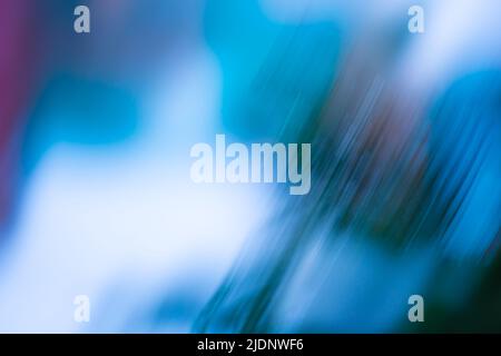 Blue and white snow bubble blurred background. Shining frozen snowy white christmas background Stock Photo