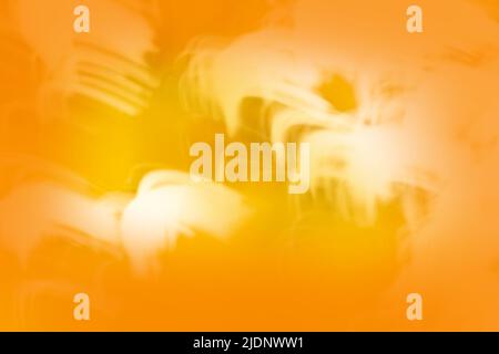 Blurry yellow orange color bokeh backdrop.Orange and yellow bokeh. Stock Photo