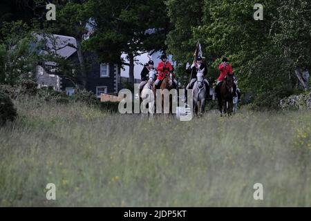 Peebles, UK. , . Beltane Wednesday - Cornets Installation, Rideout & Reel Peebles Cornet Iain Mitchell carries the flag on the traditional riding of the Marches. ( Credit: Rob Gray/Alamy Live News Stock Photo