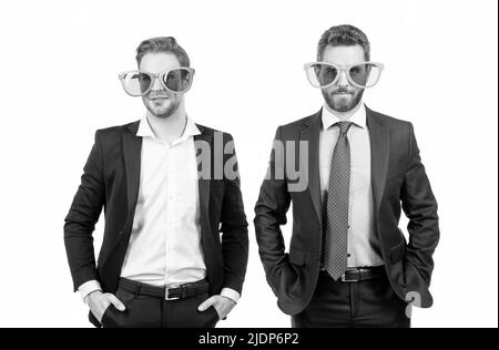 Work all day, party all night. Professional men wear funny glasses. Corporate party Stock Photo