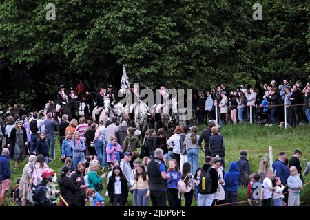 Peebles, UK. , . Beltane Wednesday - Cornets Installation, Rideout & Reel Peebles Cornet Iain Mitchell carries the flag on the traditional riding of the Marches. Flanked by his left and right hand men. Just before fording the river Tweed. ( Credit: Rob Gray/Alamy Live News Stock Photo