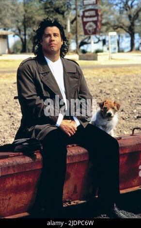 JOHN TRAVOLTA WITH DOG, MICHAEL, 1996 Stock Photo