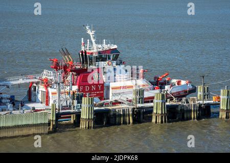 New York, NY - USA - June 18, 2022 A view of FDNY Marine 1's new 140-foot, 500-ton, $27 million dollar Fireboat Fireboat Three Forty Three at Pier 53 Stock Photo